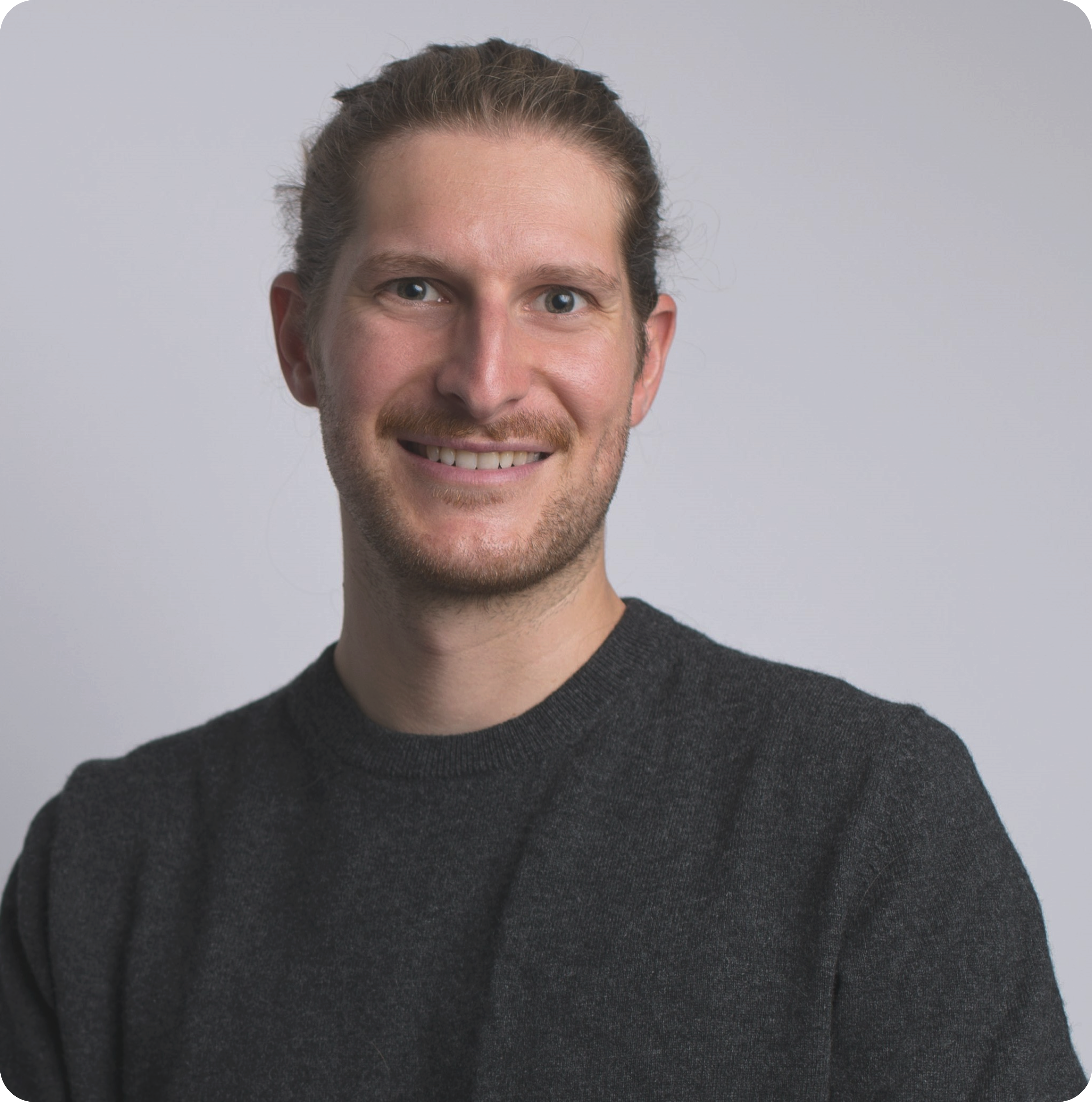 Portrait of Christoph Herr against a light background